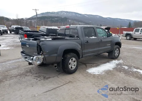 2014 Toyota Tacoma Base V6 z USA, uszkodzony, nr VIN 3TMLU4EN7EM146476